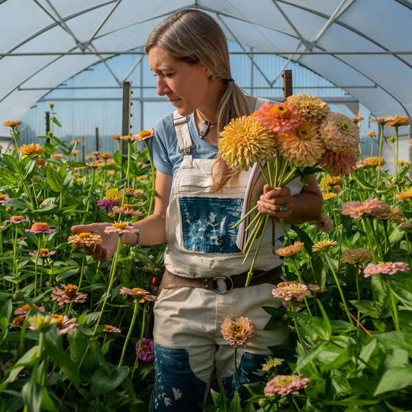 Erin Benzakein with a handful of zinnias