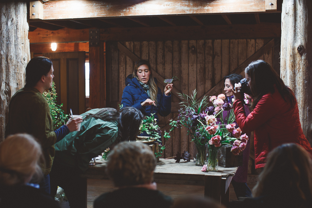 Erin Benzakein teaching a group of students at an on-farm Floret workshop