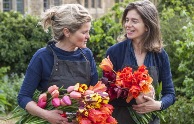 Land Gardeners portrait with tulips